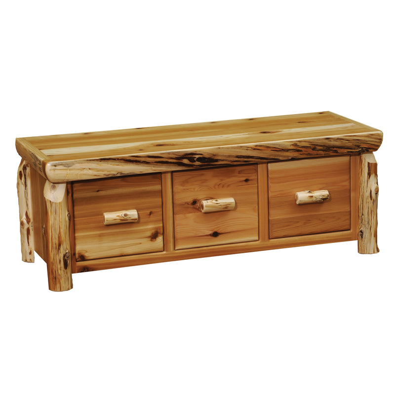 Angled view of the Apache Peak Cedar Log Three Drawer Coffee Table showing three drawers between cedar log posts