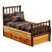 Angled view of the Bartlett Mountain Hickory Log Underbed Dresser installed under a hickory log bed with three drawers closed
