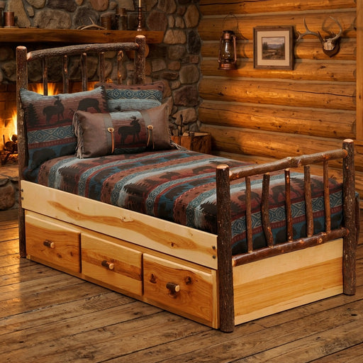 Bartlett Mountain Hickory Log Underbed Dresser staged beneath a hickory log bed by a stone fireplace in a cabin bedroom