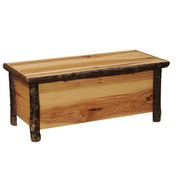 Angled view of the Bison Peak Hickory Log Blanket Chest in Natural showing bark-on hickory corner posts