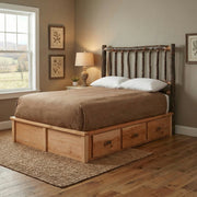 Black Mountain Hickory Log Platform Bed Underbed Dresser under a hickory platform bed in a cabin bedroom