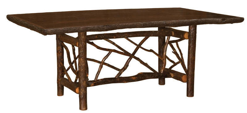 Angled view of the Boreas Mountain Hickory Log Twig Dining Table showing the twig base