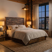 Cathedral Peak Reclaimed Barnwood Plank Platform Bed with gray bedding in a loft bedroom