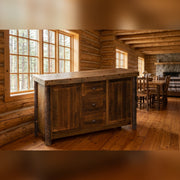 Chief Mountain Barnwood and Hickory Sideboard staged in a sunlit log cabin dining room