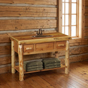 Cirque Mountain Cedar Log Two Drawer Open Vanity staged in a sunlit log cabin bathroom