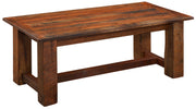 Angled view of the Clark Peak Reclaimed Barnwood Rectangle Coffee Table showing the planked top and square legs