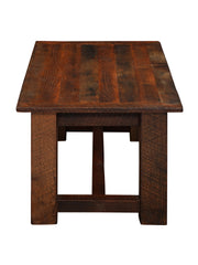 Side view of the Clark Peak Reclaimed Barnwood Rectangle Coffee Table showing the leg stretchers