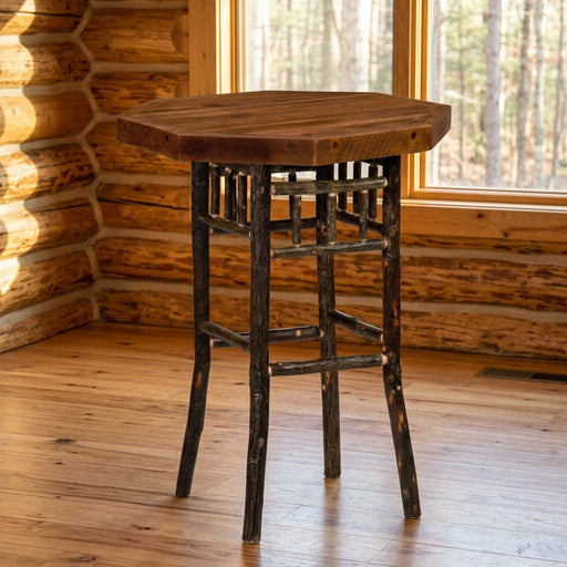 Colorado Mines Peak Barnwood and Hickory Octagon Pub Table staged in a sunlit log cabin dining room