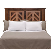 Front view of the Columbia Point Reclaimed Barnwood Chevron Headboard with white pillows
