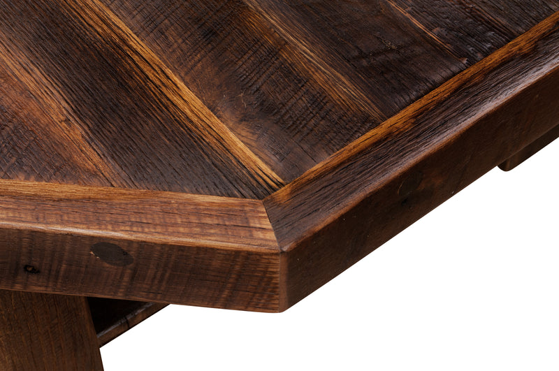 Close-up of the Comanche Peak Reclaimed Barnwood Octagon Coffee Table edge and leg joinery