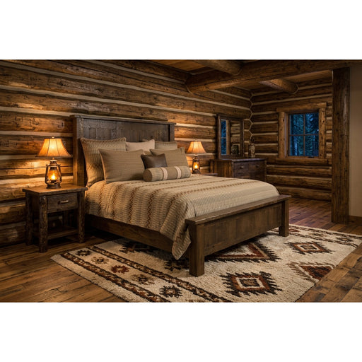 Conundrum Peak Pine Plank Bed staged in a cozy rustic log cabin bedroom