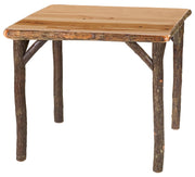 Angled view of the Coxcomb Peak Hickory Log Square Dining Table in Natural