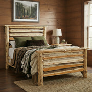 Crestone Peak Cedar Log Bed in a natural finish in a cabin bedroom with wood plank walls and green lodge bedding