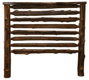 Coffee stain headboard of the Crestone Peak Cedar Log Bed showing hand-peeled horizontal cedar logs