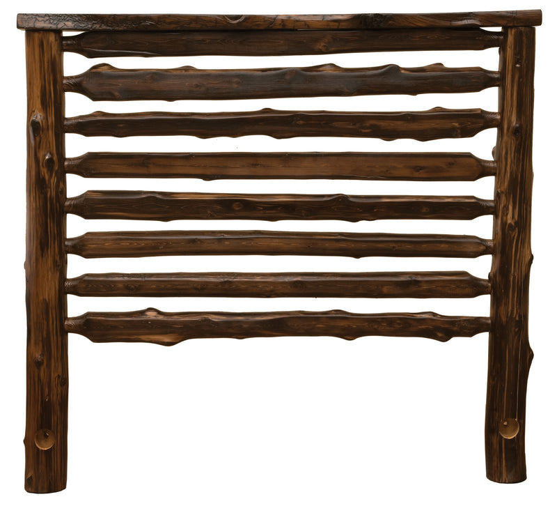Coffee stain headboard of the Crestone Peak Cedar Log Bed showing hand-peeled horizontal cedar logs
