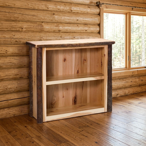 Flat Top Mountain Hickory Log Two Shelf Bookcase staged in a sunlit log cabin home office