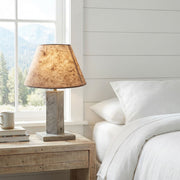 Geneva Peak Pine Table Lamp on a nightstand in a cabin bedroom