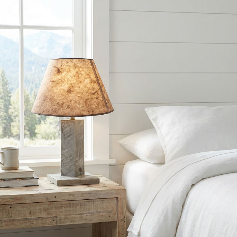 Geneva Peak Pine Table Lamp on a nightstand in a cabin bedroom