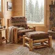 Gold Dust Peak Cedar Log Futon Chair with Ottoman with an optional cover by a cabin window