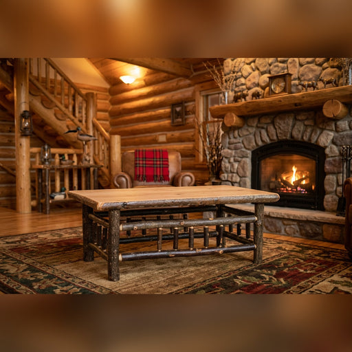 Golden Horn Hickory Log Square Coffee Table staged in a log cabin great room beside a stone fireplace