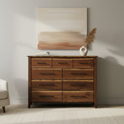 Gothic Mountain Live Edge Walnut Nine Drawer Dresser with artwork above it in a bright room