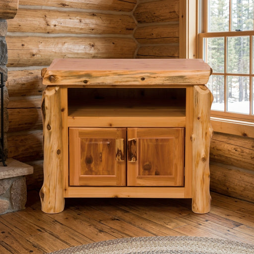 Graham Peak Cedar Log TV Stand staged in a sunlit log cabin living room