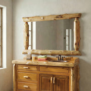 Grizzly Mountain Cedar Half Log Mirror above a log vanity