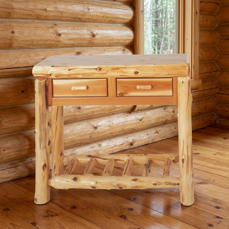 Half Peak Cedar Log Two Drawer Sofa Table staged in a sunlit log cabin living room