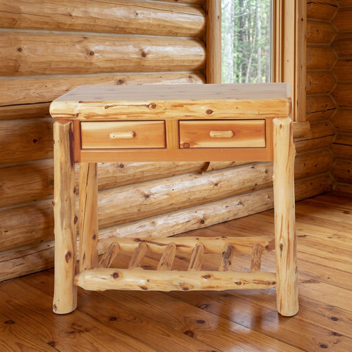 Half Peak Cedar Log Two Drawer Sofa Table staged in a sunlit log cabin living room