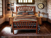 Pair of Hallett Peak Hickory Log Enclosed Nightstands beside a hickory sunburst log bed in a rustic brick-walled bedroom