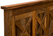 Close-up of the Hanging Lake Barnwood Barn Door Bed reclaimed oak post and X-brace detail