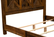 Detail of the Hanging Lake Barnwood Barn Door Bed side rail, center support, and slat system