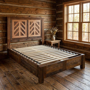Hassell Peak Reclaimed Barnwood Chevron Bed with Rail System staged in a sunlit log cabin bedroom