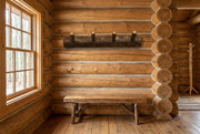 Hiamovi Mountain Hickory Log Wall Coat Rack staged in a sunlit log cabin entryway