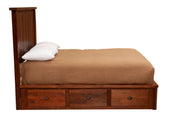 Side view of the Hoosier Ridge Reclaimed Barnwood Underbed Dresser showing three drawers along one side of the bed