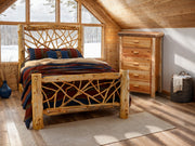 Humboldt Peak Cedar Log Five Drawer Chest beside a cedar log twig bed in a sunny loft bedroom