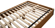 Close-up of the Huron Peak Hickory Sunburst Platform Bed slat deck, center support, and hardwood platform rail