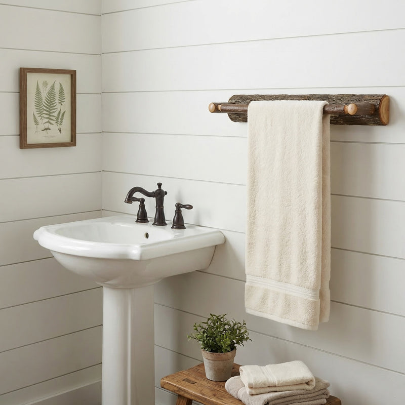 Independence Mountain Hickory Log Towel Bar with towels in a rustic bathroom