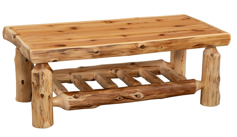 Angled view of the Isolation Peak Cedar Log Rectangle Coffee Table showing the cedar top and slatted shelf