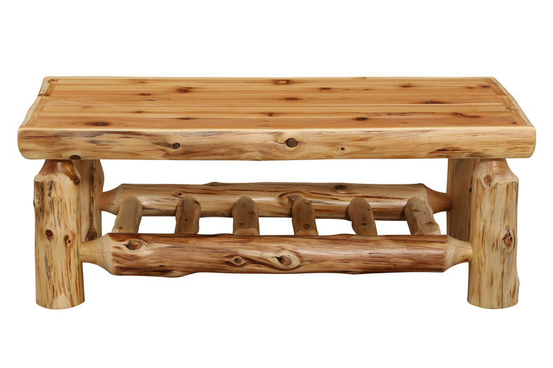 Front view of the Isolation Peak Cedar Log Rectangle Coffee Table with log legs and lower shelf