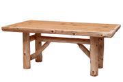 Angled view of the Kataka Mountain Cedar Log Trestle Dining Table