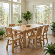 Kataka Mountain Cedar Log Trestle Dining Table set with chairs in a bright dining room