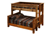 Kit Carson Peak Barnwood Bunk Bed in Twin over Queen configuration showing the wide lower bunk and timber posts