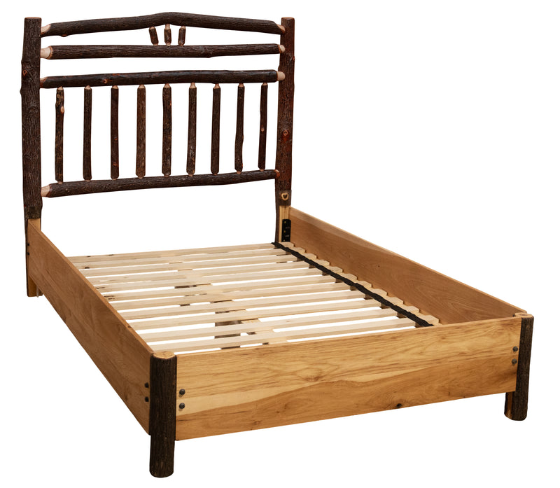 Angled view of the Lavender Peak Hickory Wagon Wheel Bed with Rail System