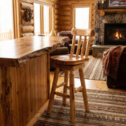 Leviathan Peak Cedar Swivel Stool with Back at a rustic kitchen counter