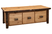 Angled view of the Lone Cone Hickory Log Three Drawer Coffee Table showing three drawers between hickory log posts