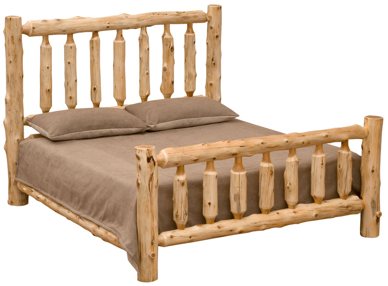 Angled view of the Longs Peak Cedar Log Bed with log spindle headboard and footboard