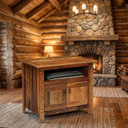 Lulu Mountain Reclaimed Barnwood TV Stand in a log cabin living room with a stone fireplace