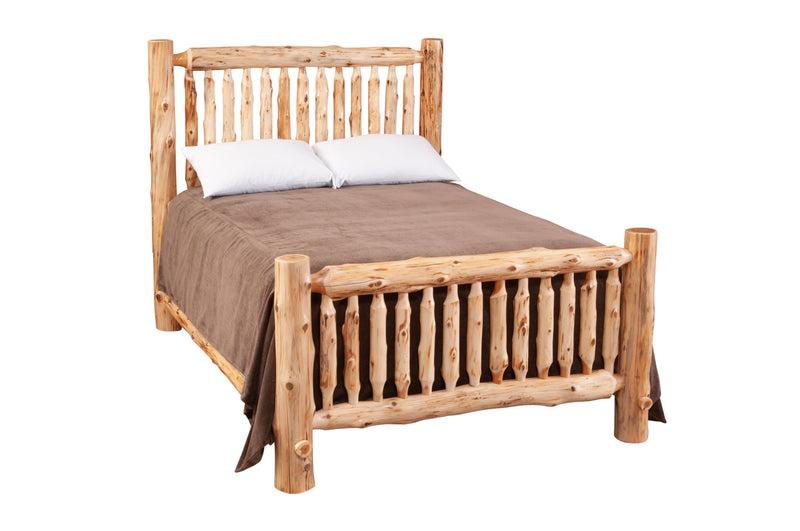 Angled view of the Maroon Bells Cedar Log Spindle Bed with brown bedding and spindle headboard
