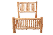 Front view of the Maroon Bells Cedar Log Spindle Bed frame without mattress showing hand-peeled cedar spindles
